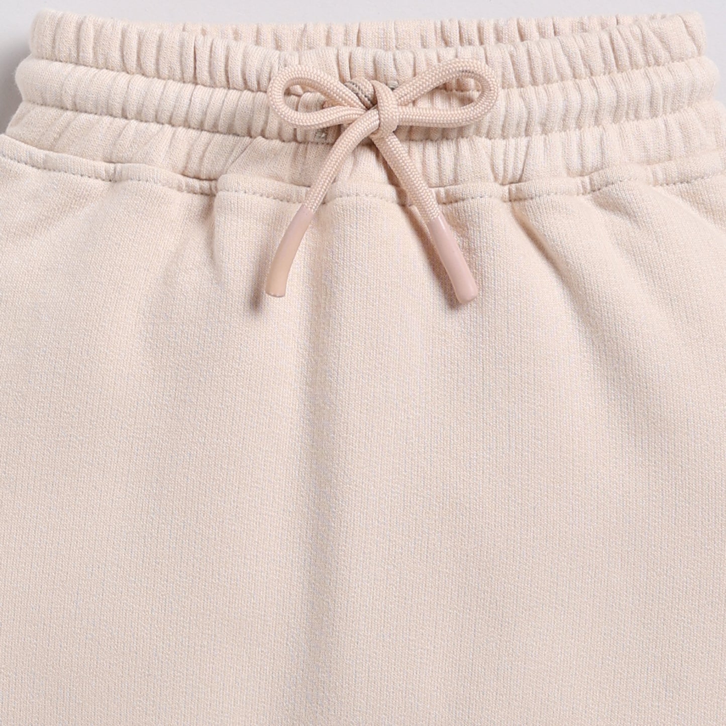 Order almond peach color organic fleece relaxed jogger for your 2-3 years baby - CotandCandyBaby