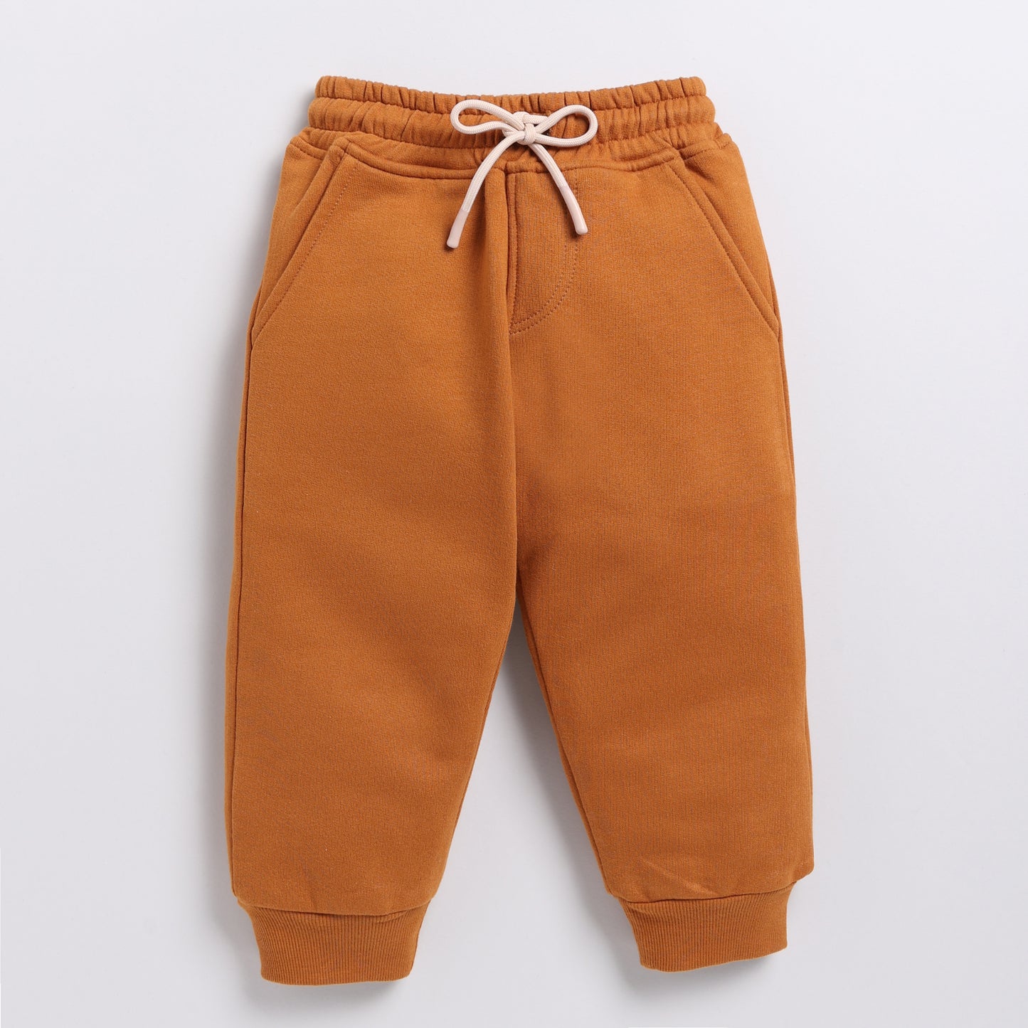 Shop pumpkin spice color organic fleece relaxed jogger online for your 4-5 years baby - CotandCandyBaby
