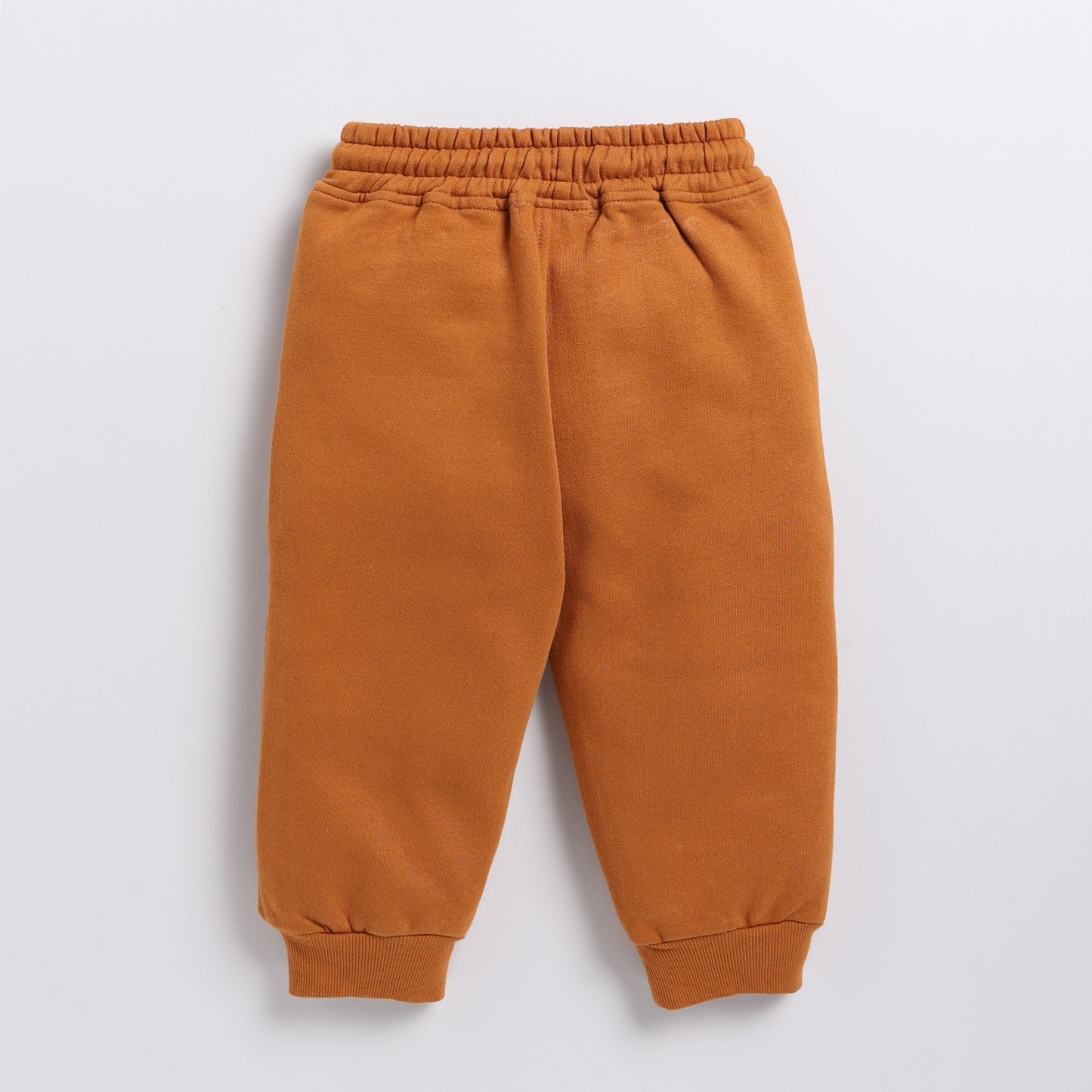 Buy pumpkin spice color organic fleece relaxed jogger for your 3 months to 5 years baby - CotandCandyBaby