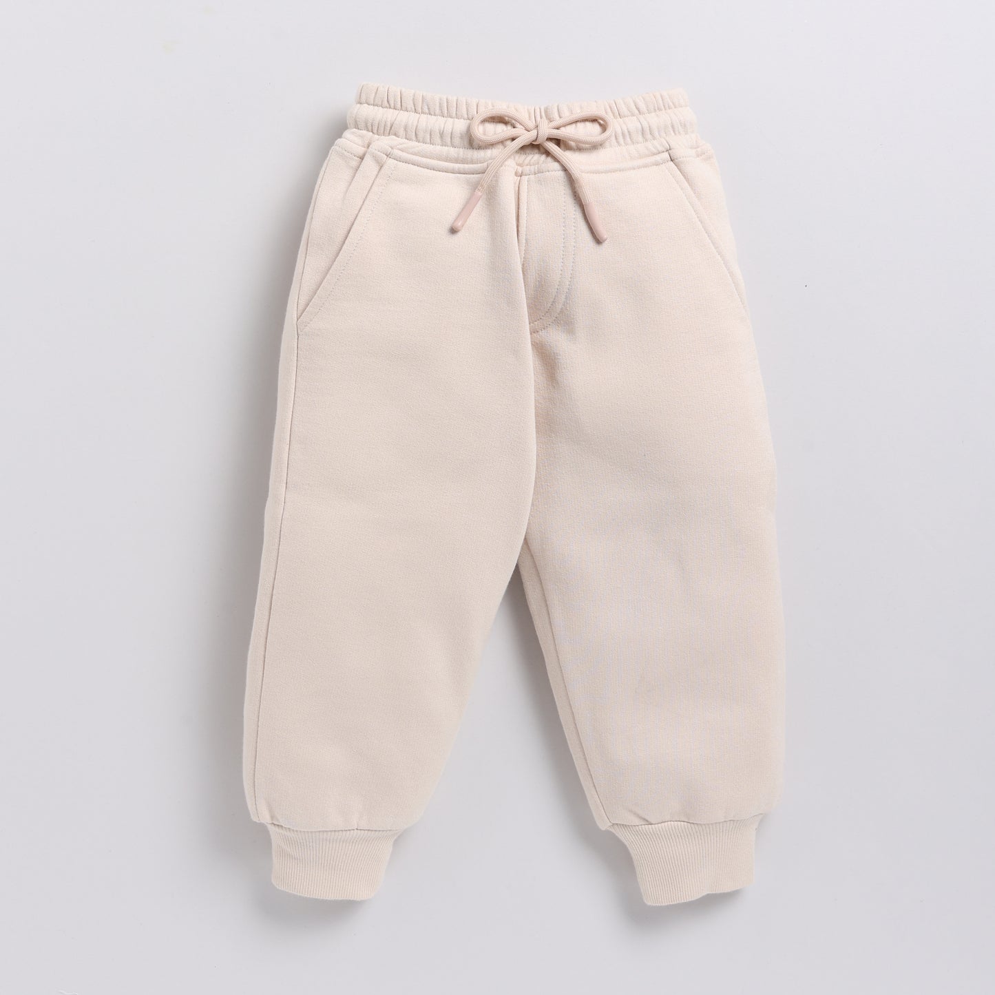 Buy almond peach color organic fleece relaxed jogger online for your 3-4 years baby - CotandCandyBaby