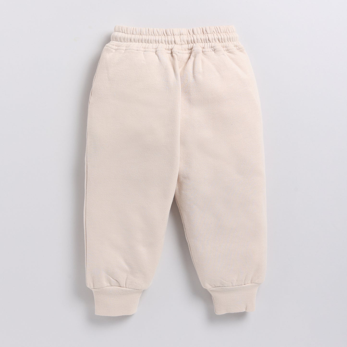 Shop almond peach color organic fleece relaxed jogger online for your 4-5 years baby - CotandCandyBaby
