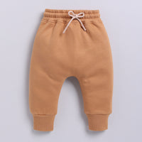 Load image into Gallery viewer, Buy biscuit color organic fleece relaxed jogger for your 3-6 months baby - CotandCandyBaby
