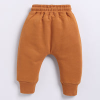 Load image into Gallery viewer, Order pumpkin spice color organic fleece relaxed jogger for your 2-3 years baby - CotandCandyBaby
