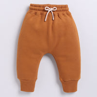 Load image into Gallery viewer, Find pumpkin spice color organic fleece relaxed jogger for your 18-24 months baby - CotandCandyBaby
