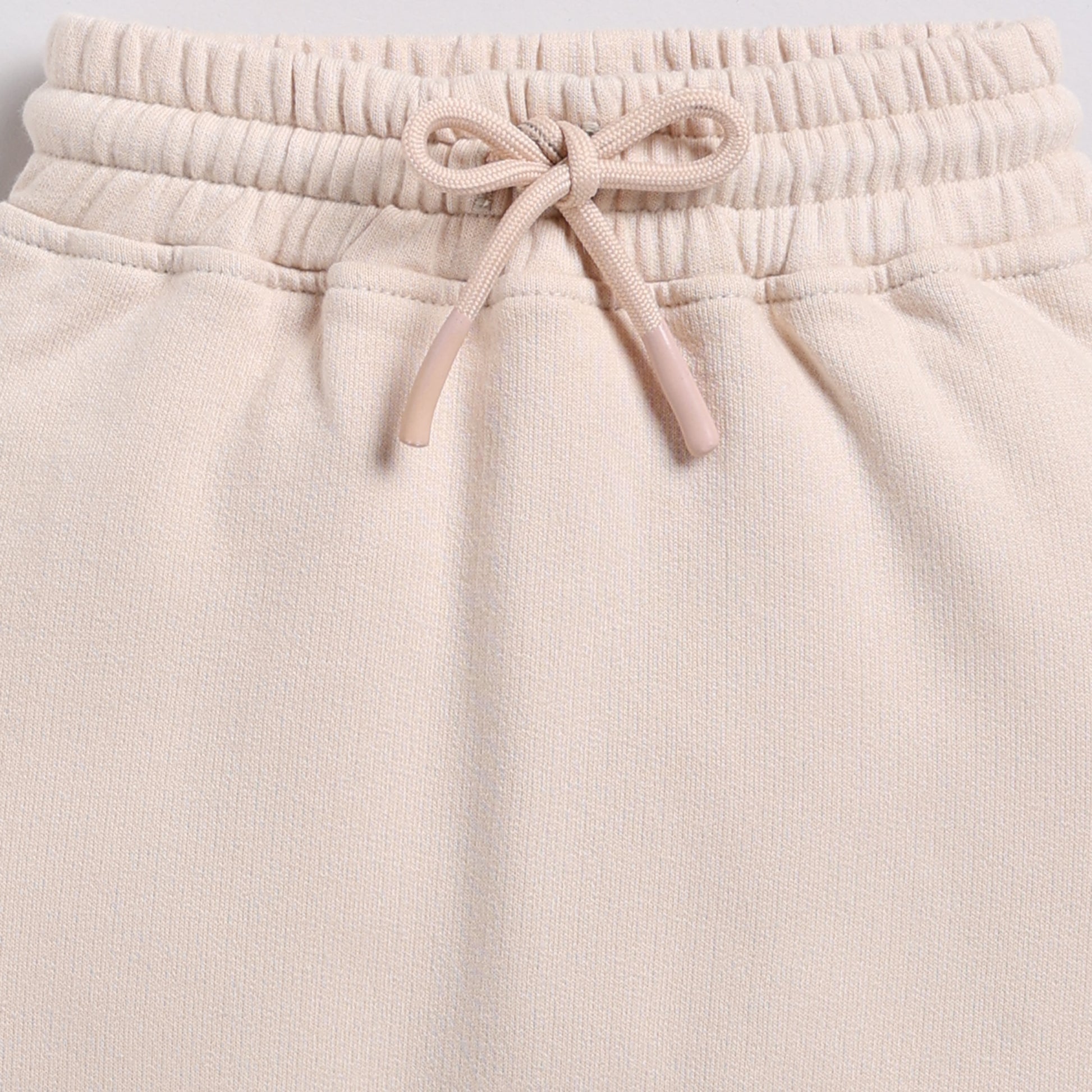 Order almond peach color organic fleece relaxed jogger for your 2-3 years baby - CotandCandyBaby