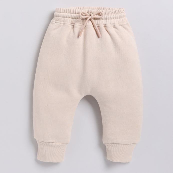 Get almond peach color organic fleece relaxed jogger for your 12-18 months baby - CotandCandyBaby