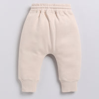 Load image into Gallery viewer, Find almond peach color organic fleece relaxed jogger for your 18-24 months baby - CotandCandyBaby
