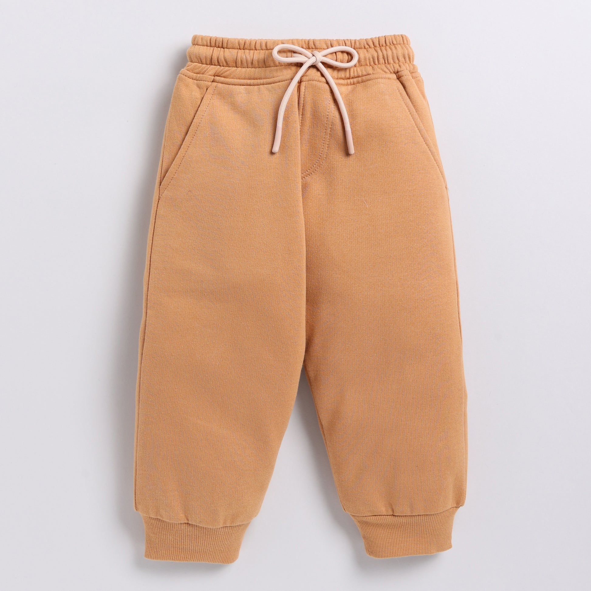 Buy biscuit color organic fleece relaxed jogger online for your 3-4 years baby - CotandCandyBaby
