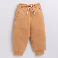 Load image into Gallery viewer, Buy biscuit color organic fleece relaxed jogger online for your 3-4 years baby - CotandCandyBaby
