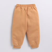 Load image into Gallery viewer, Shop biscuit color organic fleece relaxed jogger online for your 4-5 years baby - CotandCandyBaby
