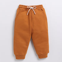 Load image into Gallery viewer, Shop pumpkin spice color organic fleece relaxed jogger online for your 4-5 years baby - CotandCandyBaby
