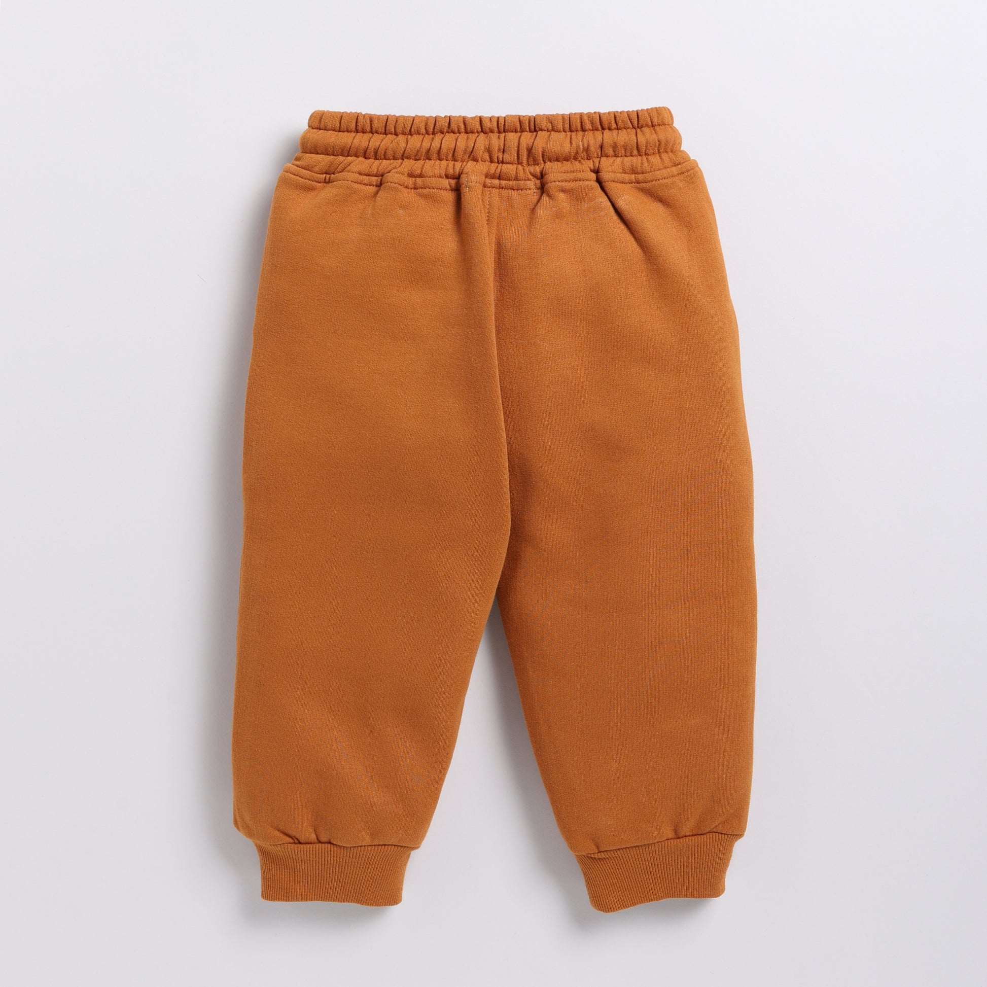 Buy pumpkin spice color organic fleece relaxed jogger for your 3 months to 5 years baby - CotandCandyBaby