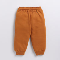 Load image into Gallery viewer, Buy pumpkin spice color organic fleece relaxed jogger for your 3 months to 5 years baby - CotandCandyBaby
