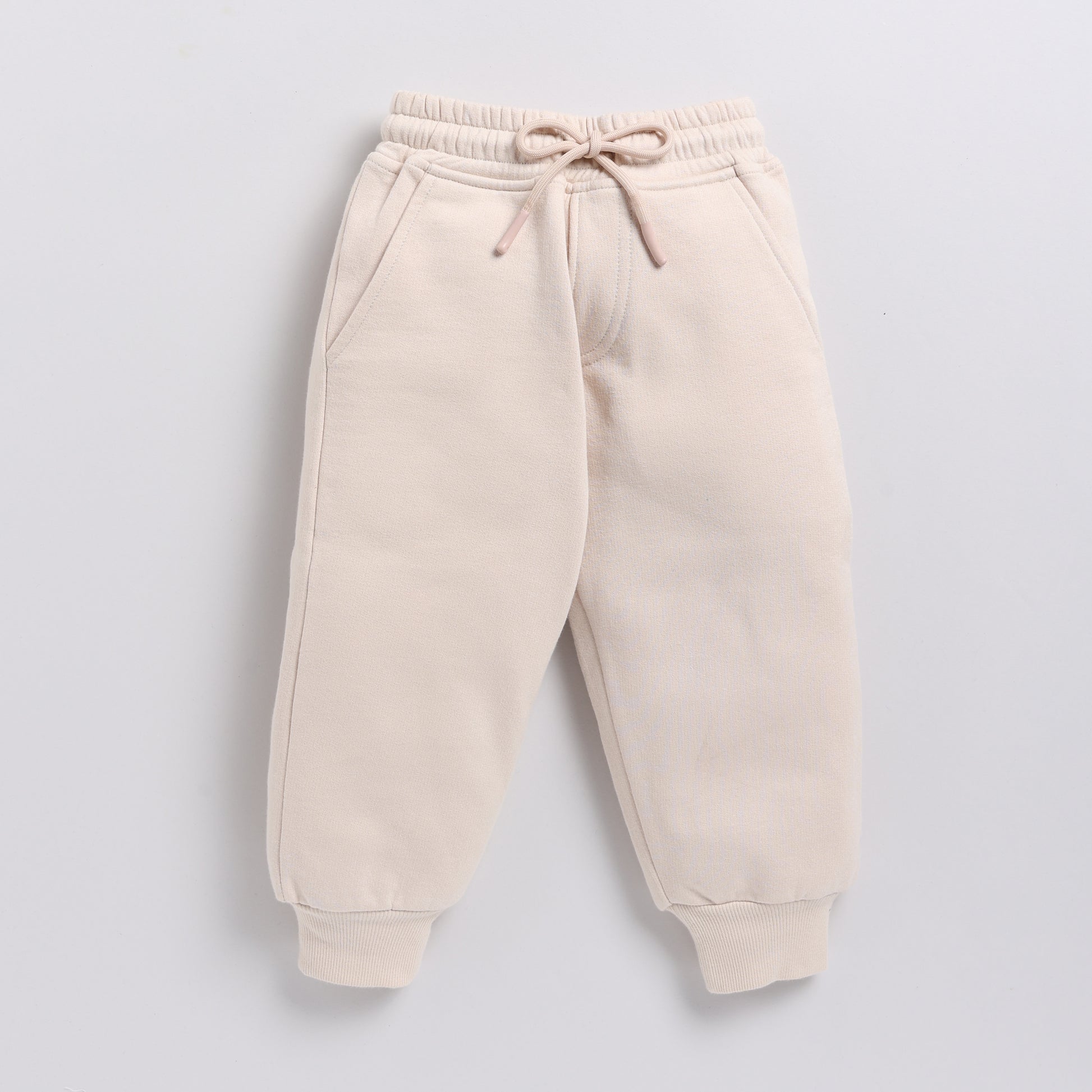 Buy almond peach color organic fleece relaxed jogger online for your 3-4 years baby - CotandCandyBaby