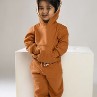 Load and play video in Gallery viewer, Best quality pumpkin spice color organic fleece hoodie &amp; jogger set online for your 3 months to 5 years baby - CotandCandyBaby
